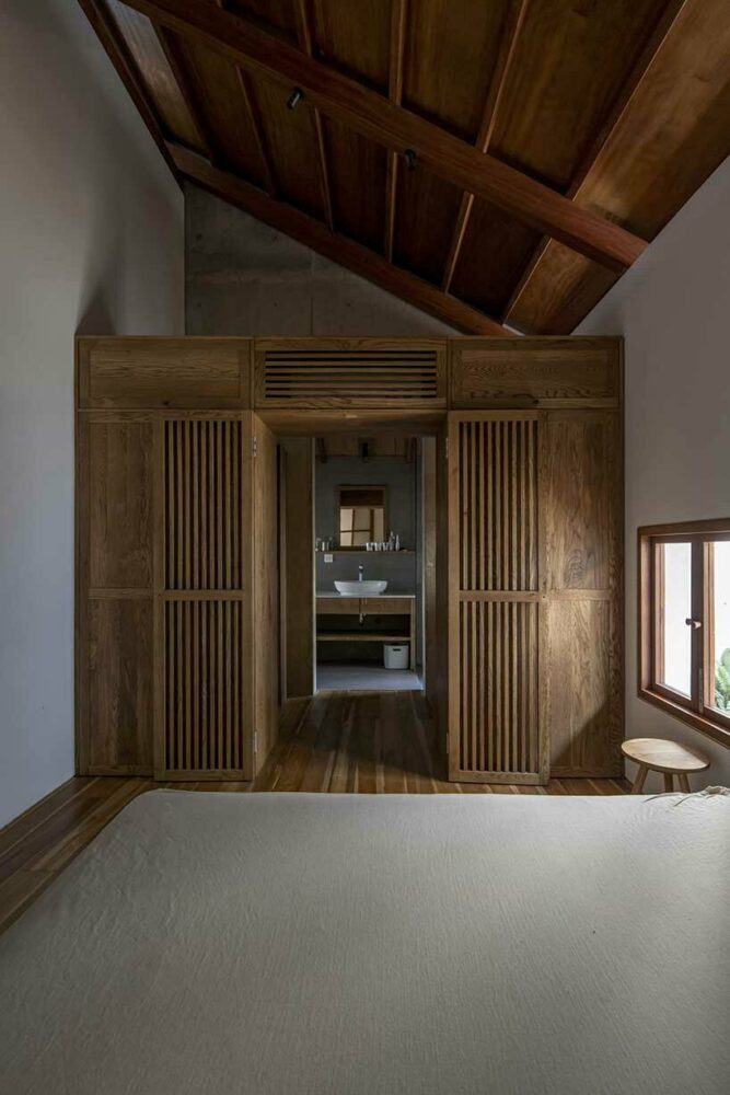 intersecting geometries form AHL architects’ DHY house and café in vietnam