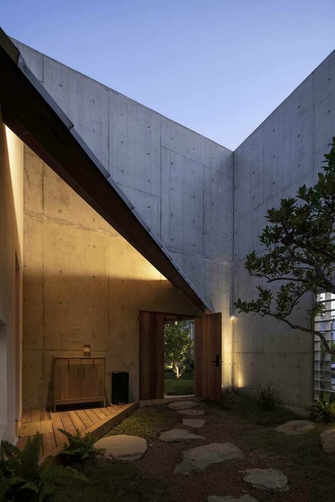 intersecting geometries form AHL architects’ DHY house and café in vietnam