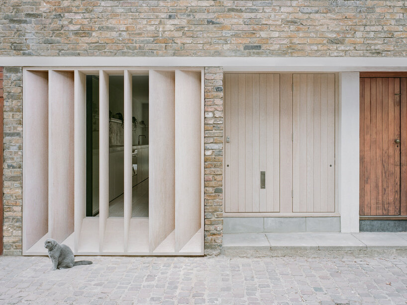 old garage transformed into minimalist family home in primrose hill's cobbled mews