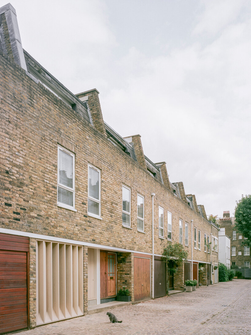 old garage transformed into minimalist family home in primrose hill's cobbled mews