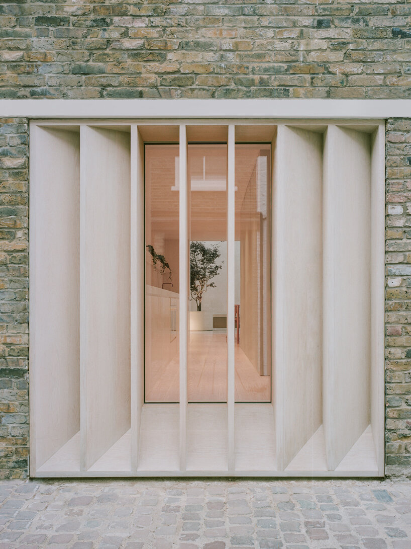 old garage transformed into minimalist family home in primrose hill's cobbled mews