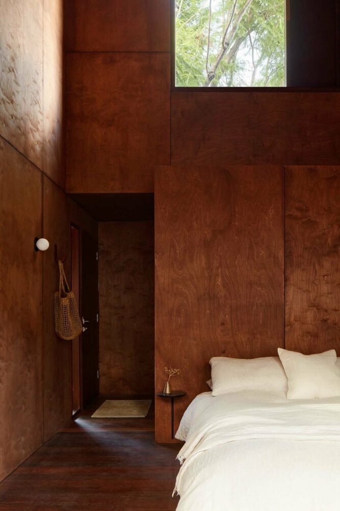 grotto studio extends perth cottage with charred timber ‘shadow house’