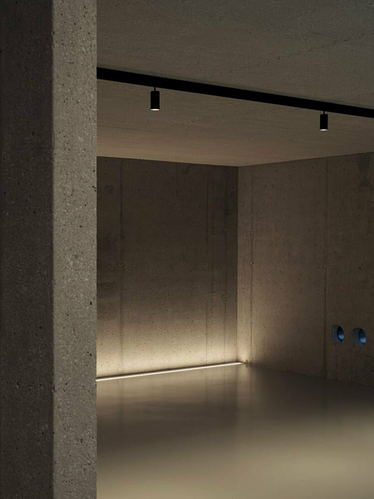 stone walls and warm wooden features adorn private residence in northern italy