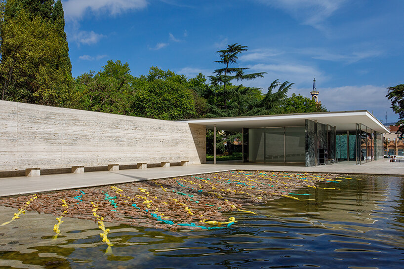 endless plastic bags fill mies van der rohe’s barcelona pavilion to spotlight the cost of money