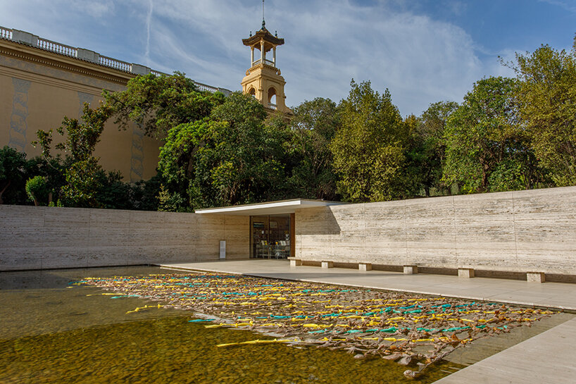 endless plastic bags fill mies van der rohe’s barcelona pavilion to spotlight the cost of money