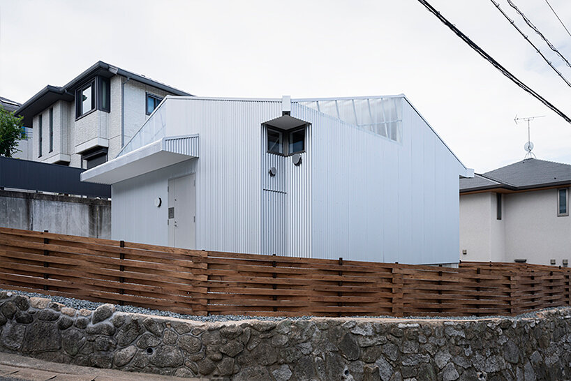 micelle tops house in japan with translucent membrane to control outside temperatures