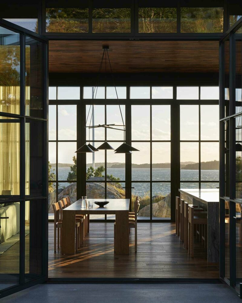 olson kundig embeds its dalarö house into sweden’s rocky coastline