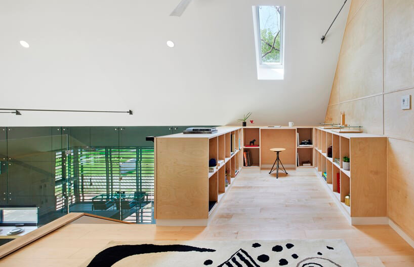 black reflective recyclable cladding coats pinkney neighborhood house in kansas