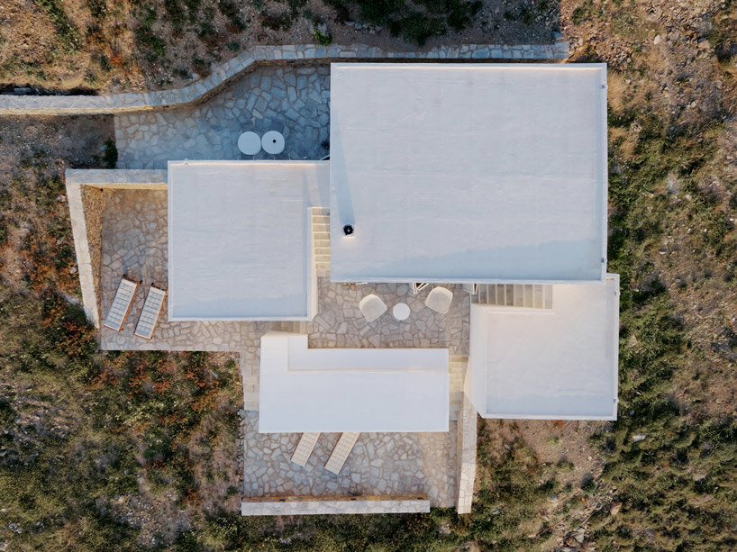 sigurd larsen sculpts interconnected cubes for single house on rocky greek island