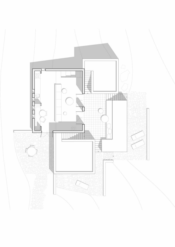 sigurd larsen sculpts interconnected cubes for single house on rocky greek island