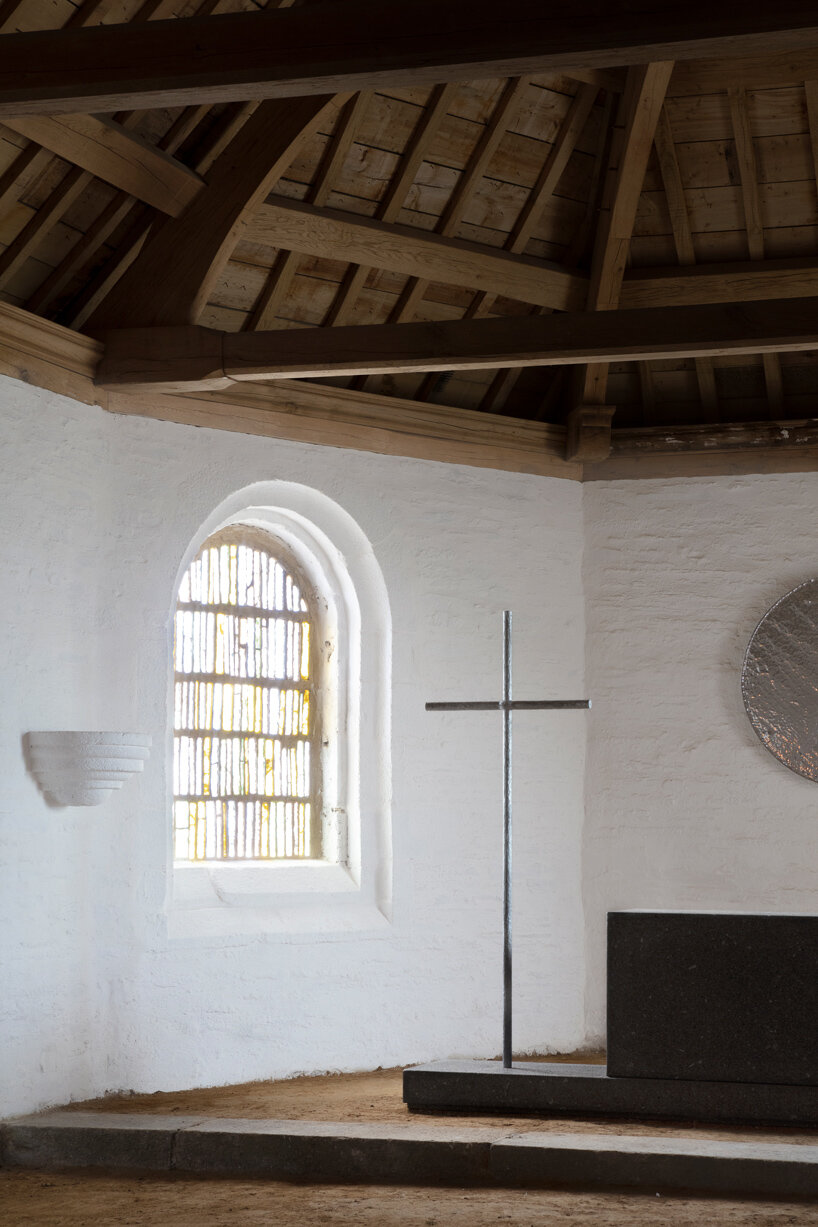 ronan bouroullec adorns restored chapel in monts d'arréel with minimal stone-sculpted altar