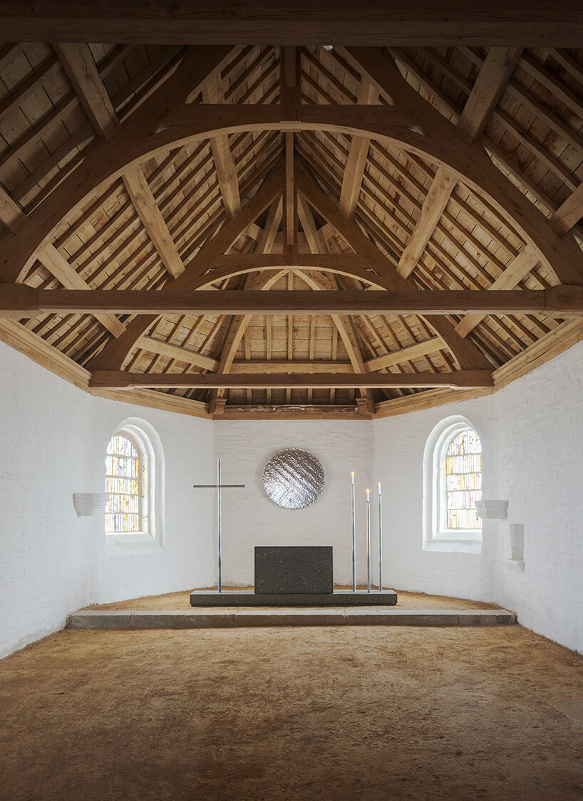 ronan bouroullec adorns restored chapel in monts d'arréel with minimal stone-sculpted altar