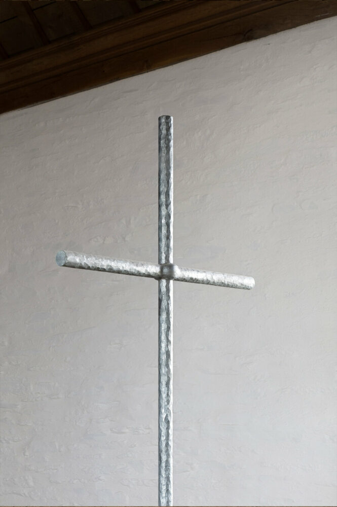 ronan bouroullec adorns restored chapel in monts d’arréel with minimal stone-sculpted altar