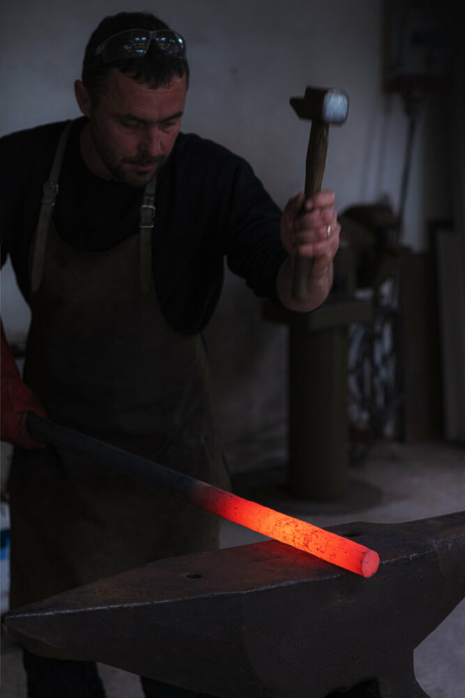 ronan bouroullec adorns restored chapel in monts d’arréel with minimal stone-sculpted altar