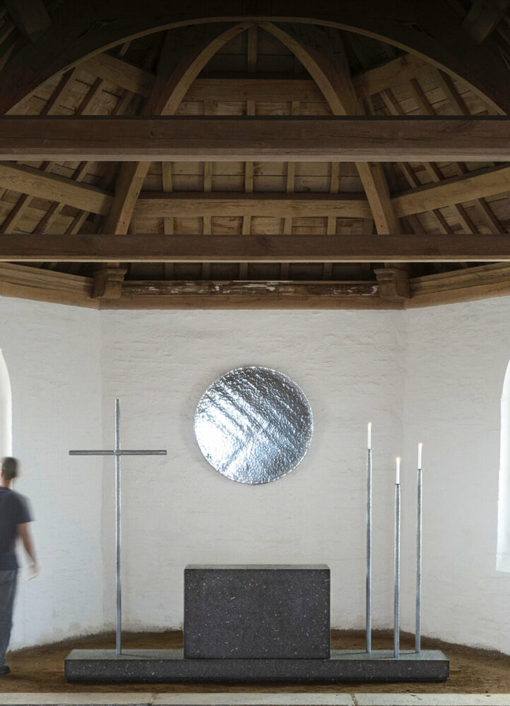 ronan bouroullec adorns restored chapel in monts d’arréel with minimal stone-sculpted altar