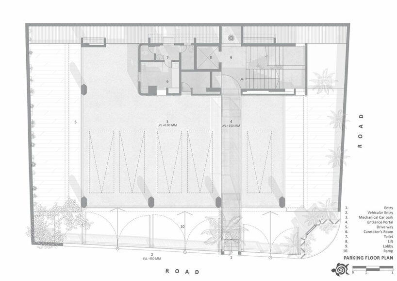 shared workspaces in india are wrapped in a living facade of stone planters