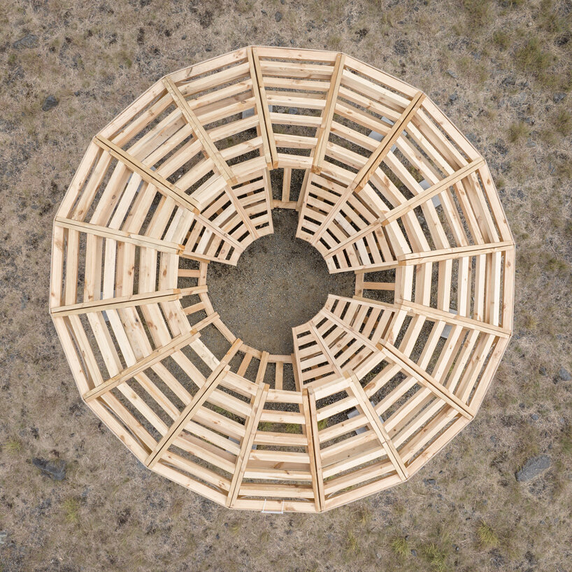 spaceship earth timber installation lands at hello wood festival in hungary