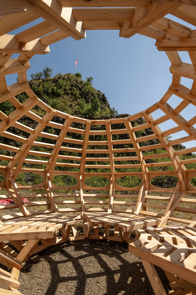 spaceship earth timber installation lands at hello wood festival in hungary