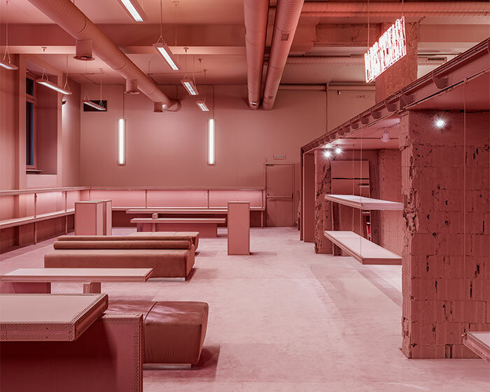 vibrant shades of pink clad paris texas showroom by studioboom in milan