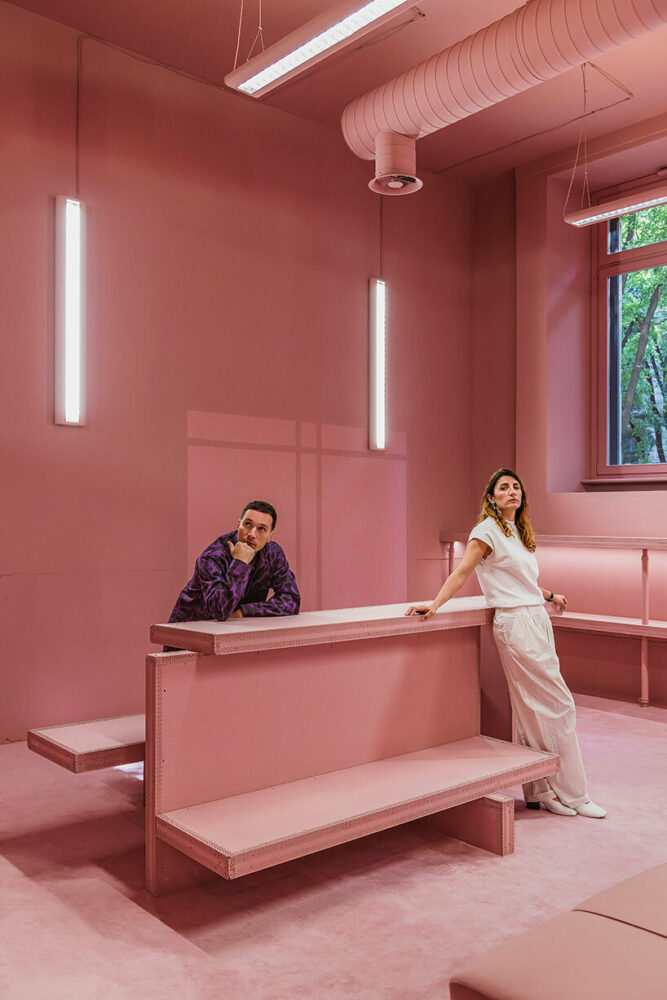 vibrant shades of pink clad paris texas showroom by studioboom in milan