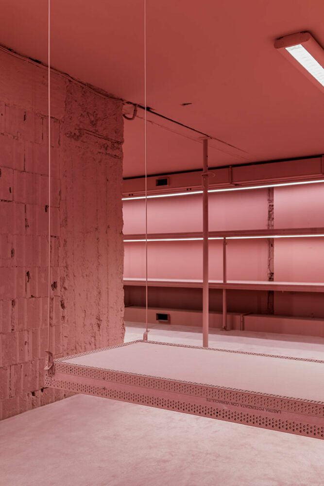 vibrant shades of pink clad paris texas showroom by studioboom in milan