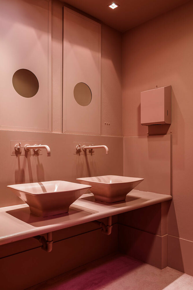 vibrant shades of pink clad paris texas showroom by studioboom in milan