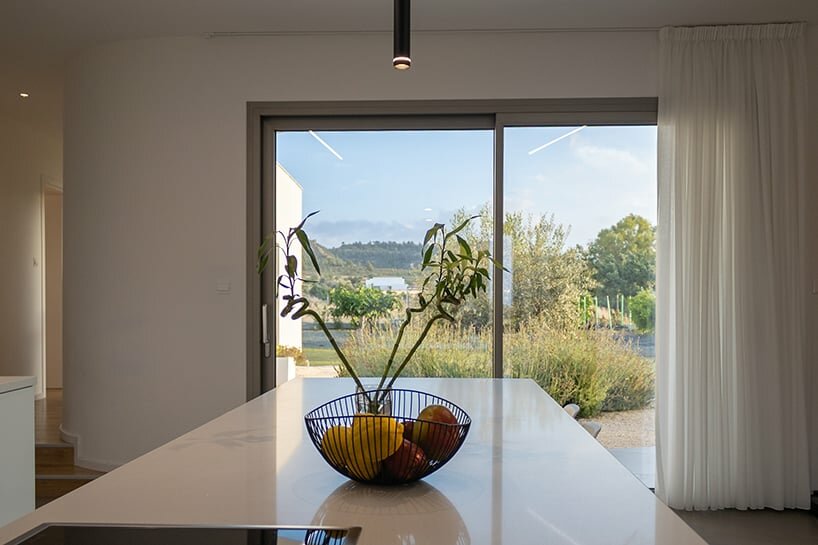the kitchen overlooks toward the landscape