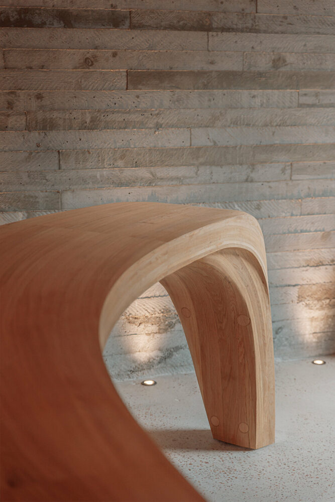 its curvilinear form glides through the spaces