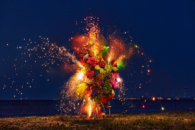 azuma makoto's botanical sculpture blossoms amidst colorful fireworks