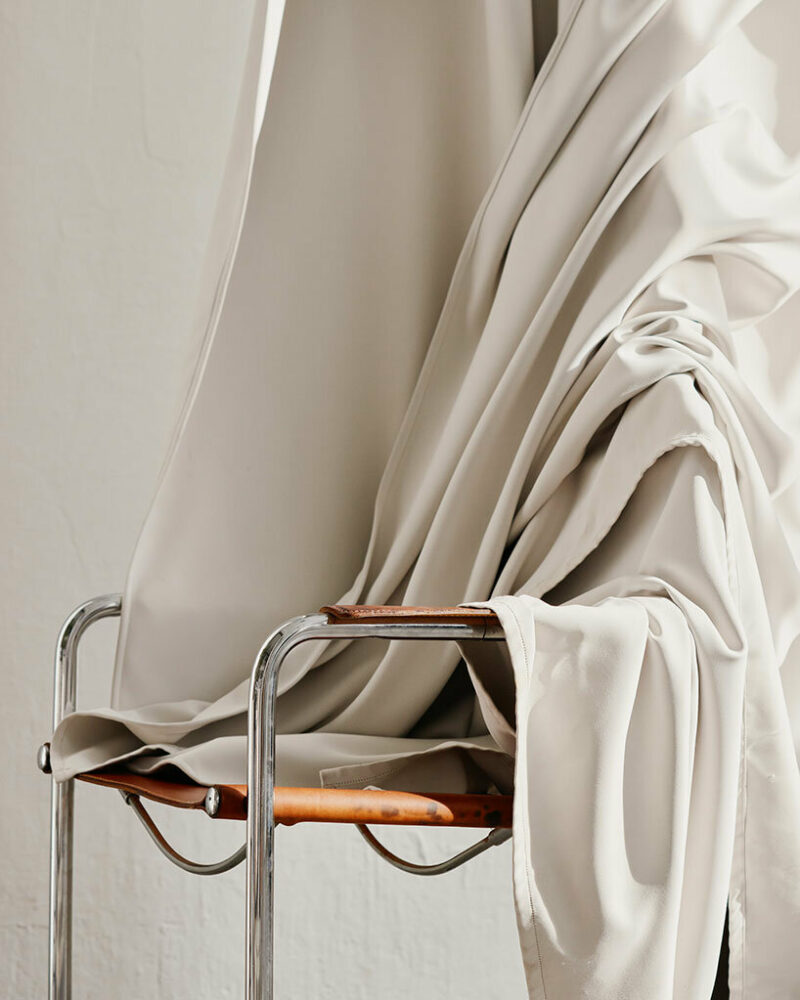 step inside the minimalist interior of hamburg-based kju.studio, captured by david altrath