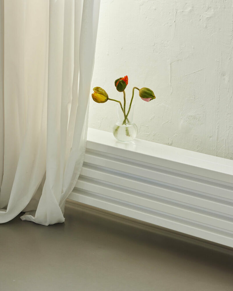 step inside the minimalist interior of hamburg-based kju.studio, captured by david altrath