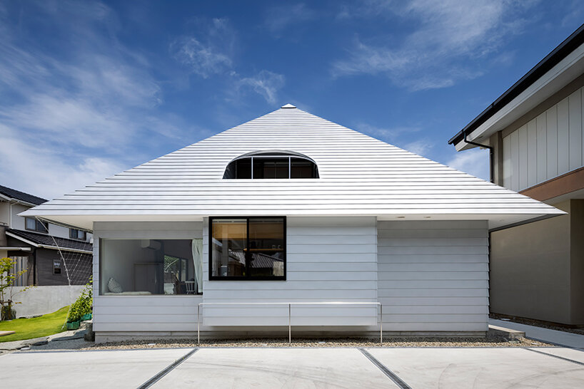 roof terrace and courtyard enhance family bonds within japanese house by container design