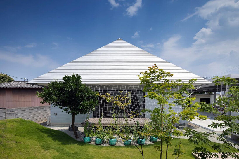 roof terrace and courtyard enhance family bonds within japanese house by container design