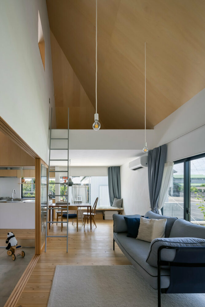 the sculptural roof hosts cozy niches at its geometrical form