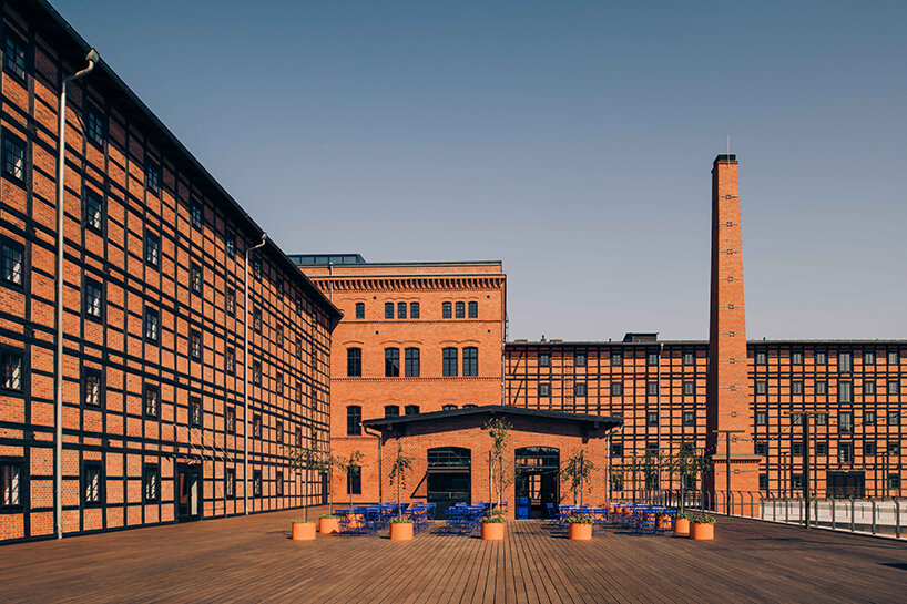 cobalt blue and warm orange tones pair up inside poland's pastry club woda - 1