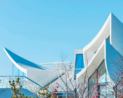 sharp edged white volumes compose IROJE KHM's sailing house in south korea