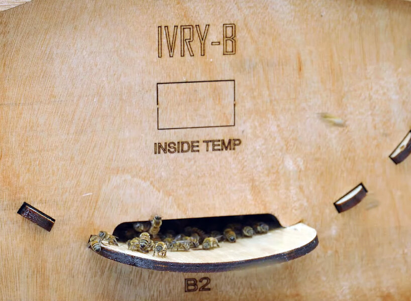 the design has dual entrances and exits around the barrel to enable airflow while making sure the bees are kept inside