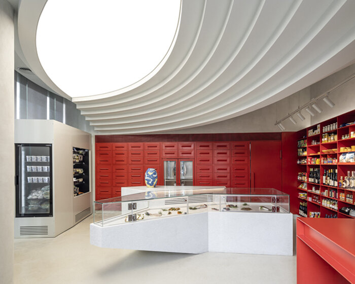 futuristic strokes punctuate baranowitz & goldberg's high-end fishmonger shop in tel aviv
