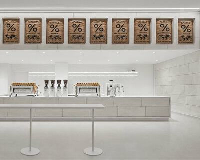 % arabica's flagship in toronto reveals faceted walls inspired by glacial and rock formations
