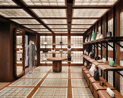 industrial glass blocks engulf bottega veneta's avenue montaigne flagship store in paris