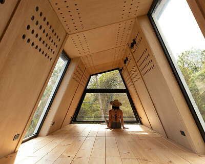 prefabricated SULA cabin journeys from quito to its galápagos island site