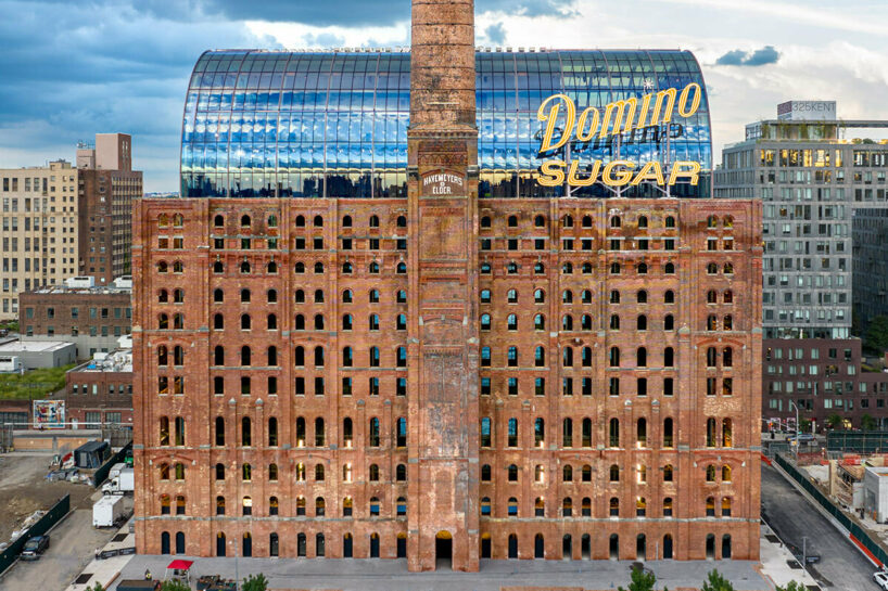 the iconic, 240-foot smokestack that faces the western facade of the building came decades later in the 1930s