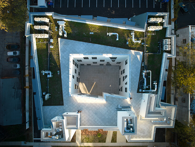 the central open area has been specially crafted as a landscaped courtyard for the enjoyment of residents