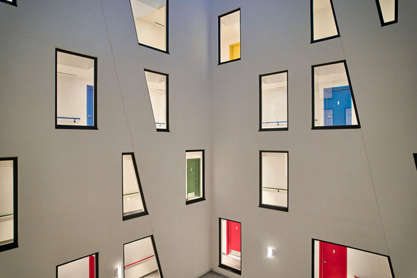 the openings overlook the central courtyard, fostering interactions among residents