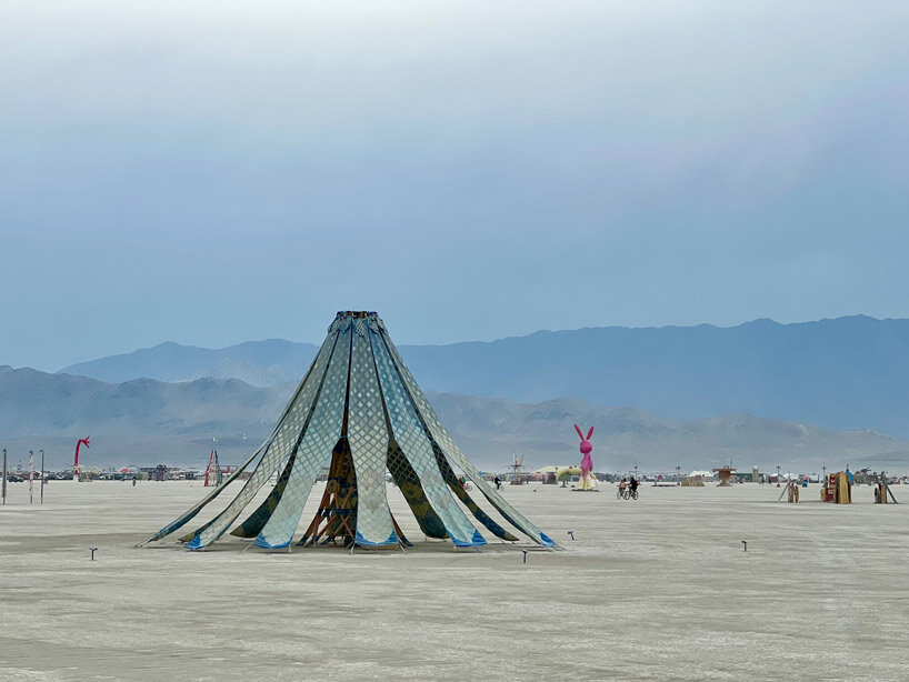 MIT's living knitwork pavilion changes color and pattern as burning man attendees dance