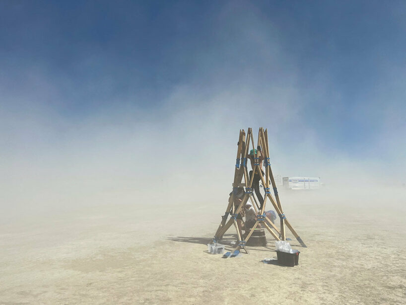 MIT's living knitwork pavilion changes color and pattern as burning man attendees dance