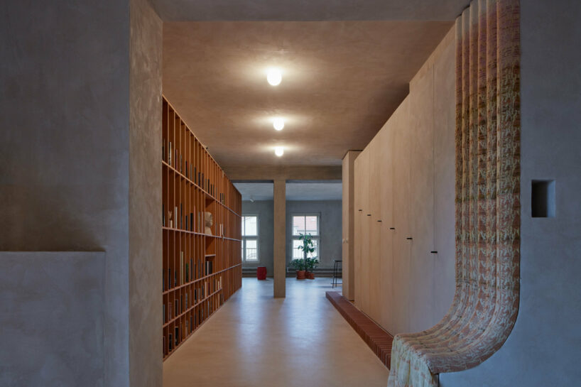 open-plan apartment in prague integrates hidden niches, arches & intricate patterns - 1