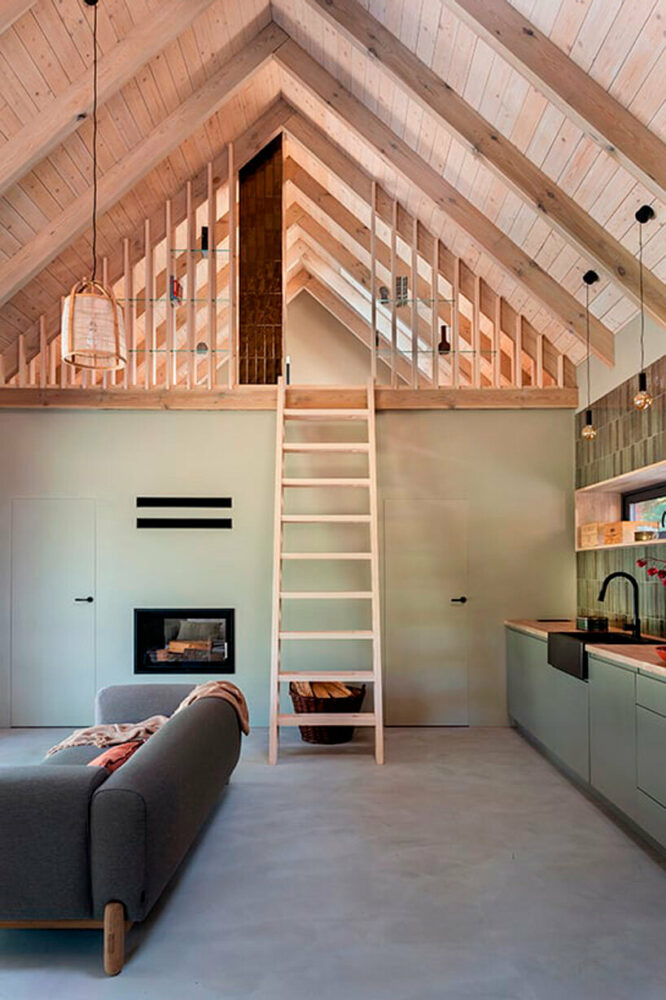 the mezzanine is defined by a ceramic chimney and delicate shelving structure