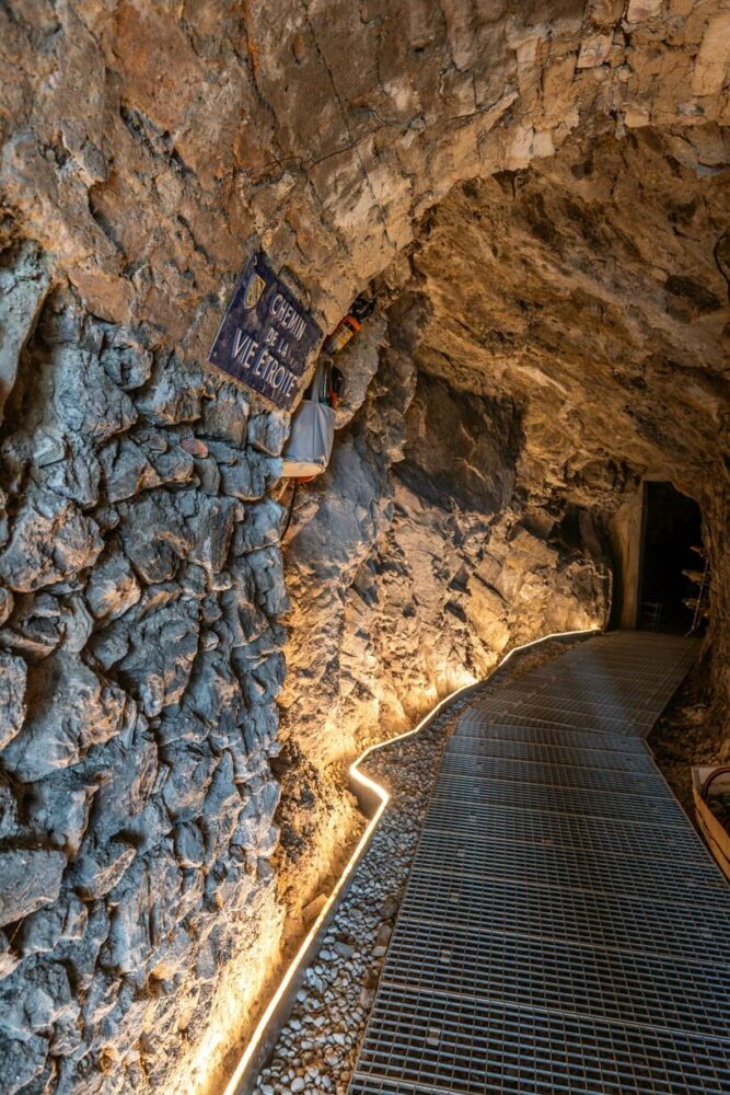 the wine cave, an ancient military tunnel excavated into the mountain, becomes an extension of the living space