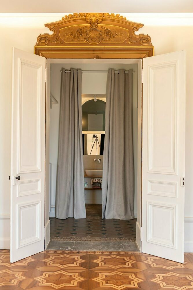 the service and common areas are arranged within an elongated layout in the back of the house